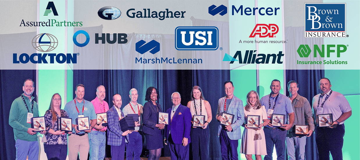 Giant Killer Award winners 2026 on stage at ASCEND, with sponsor logos