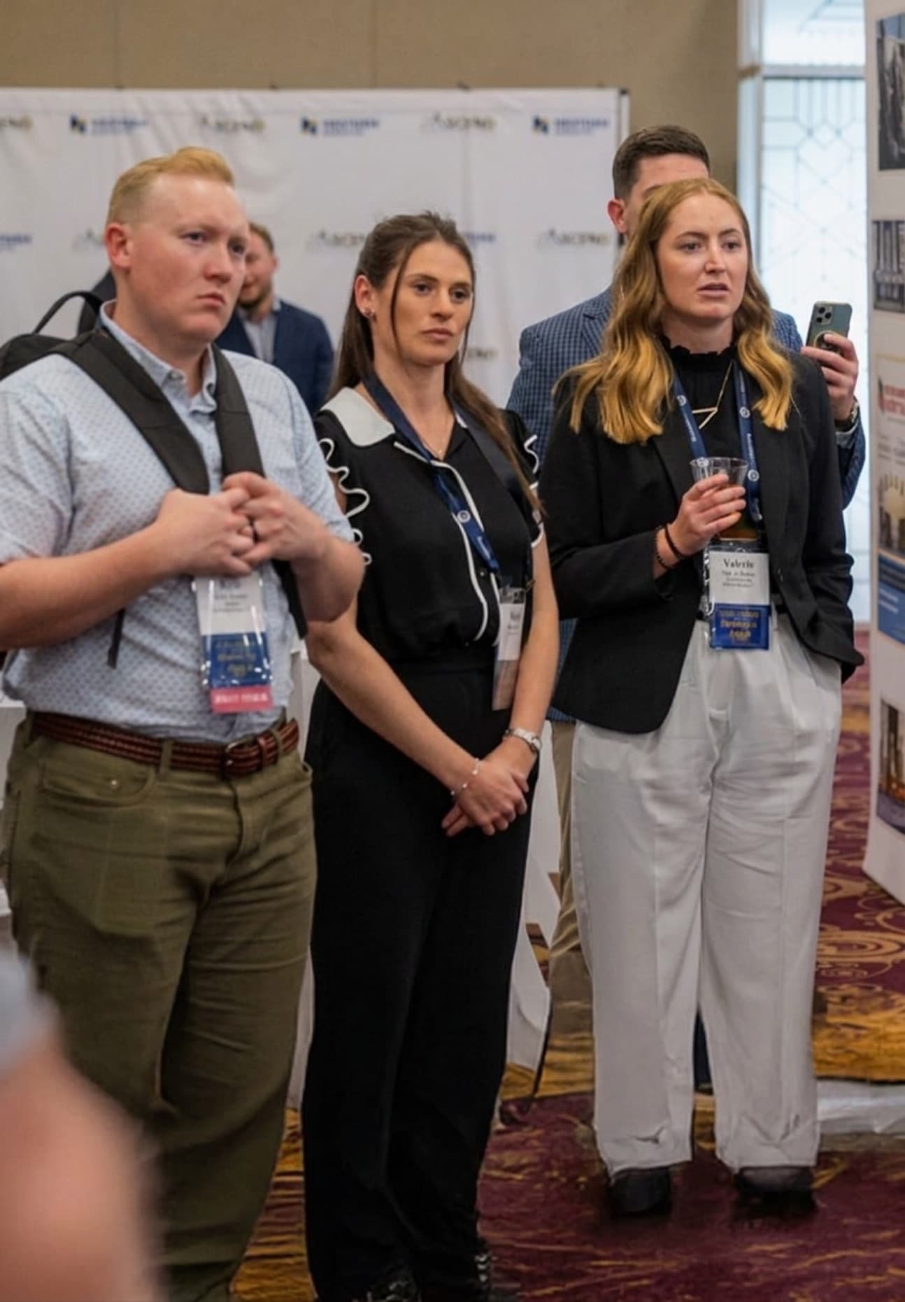 Attendees on a guided small-group tour of the ASCEND exhibit hall