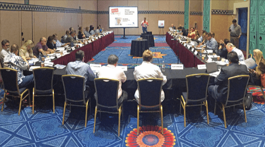 Independent benefits agency leaders around the U-shaped Mastermind Partnership roundtable